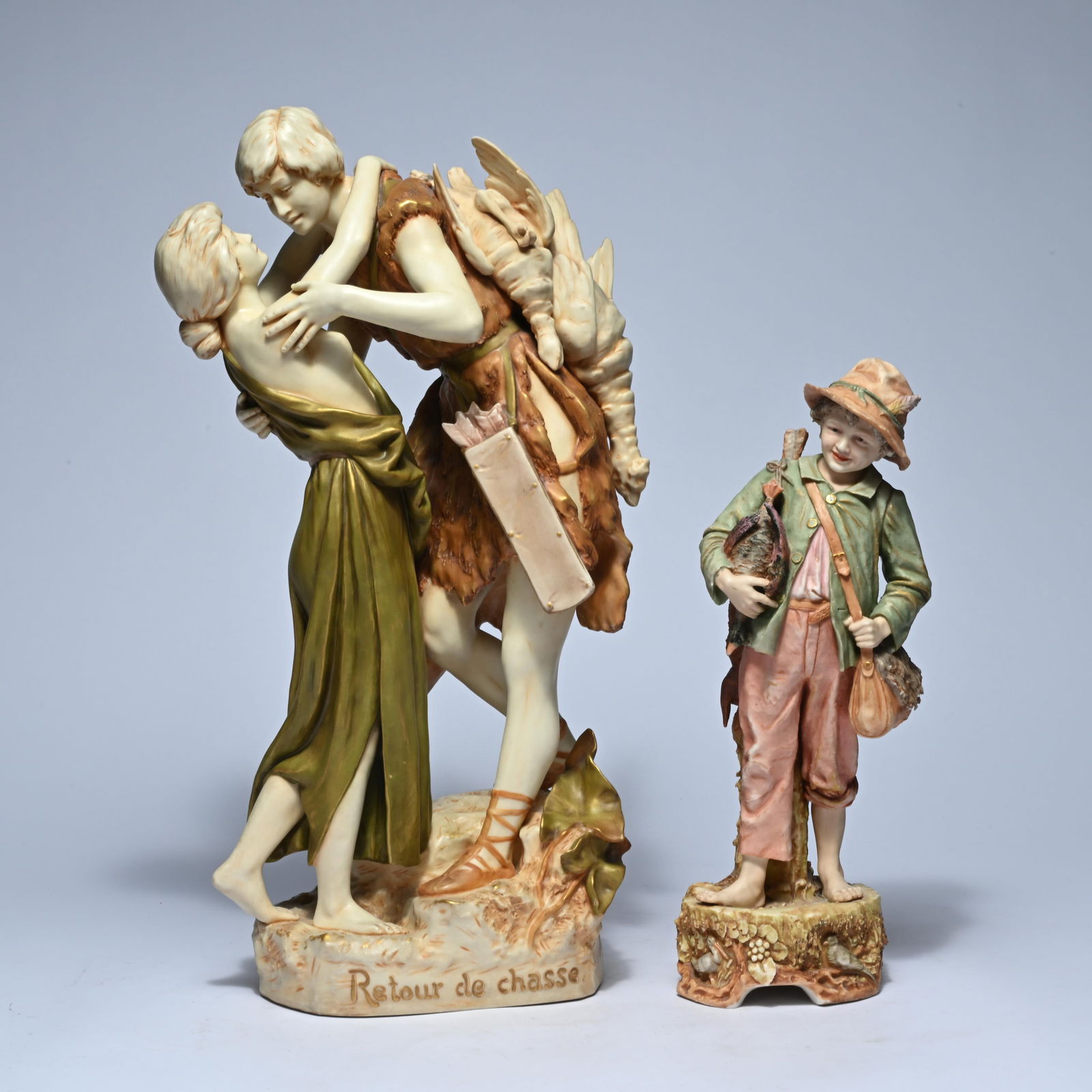 2 Royal Dux polychrome porcelain figurines 'Retour à la chasse', marked and signed Hampel and 'Boy (1 of 18)