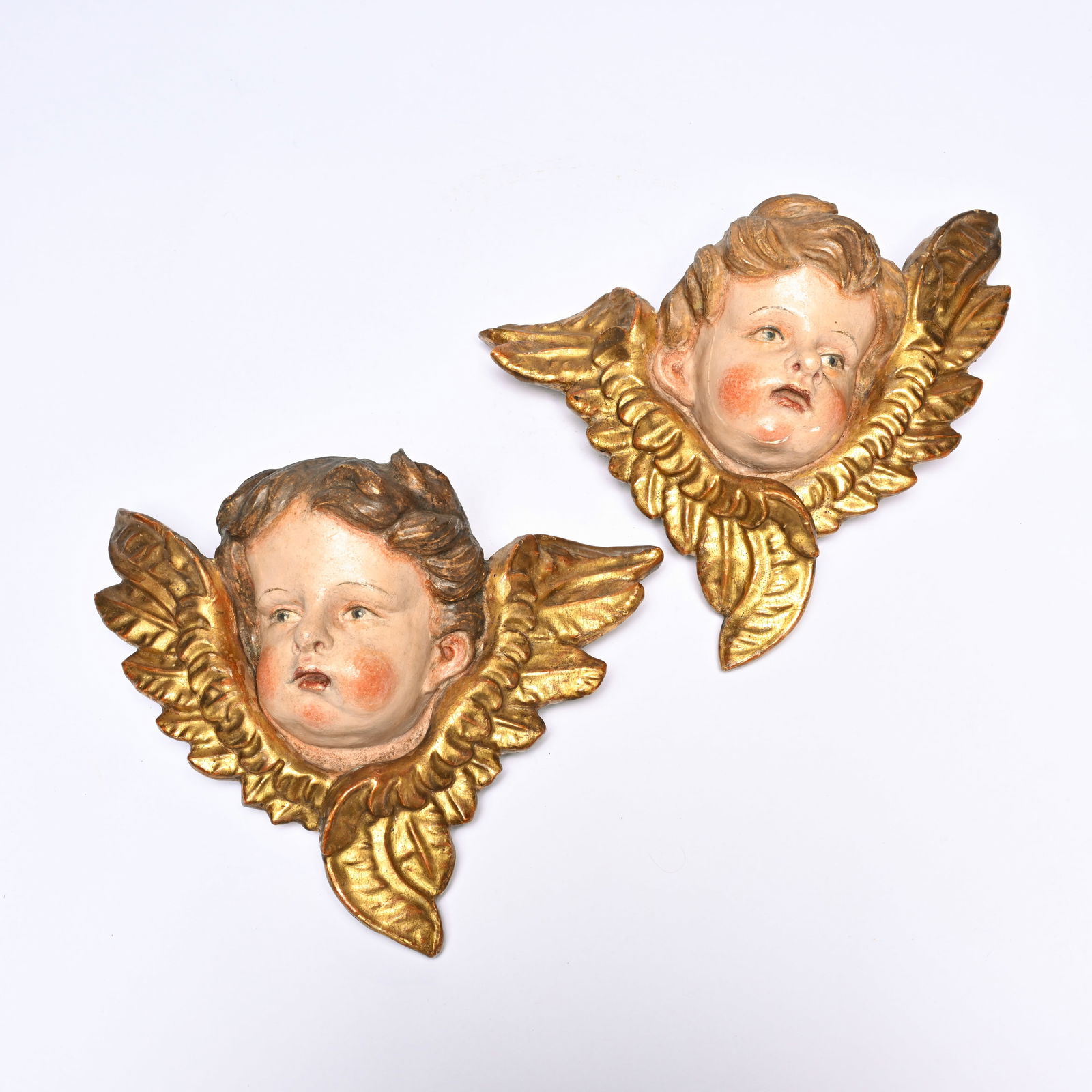 2 finely carved and polychromed Baroque angel heads, South Germany or Austria, 18th century (1 of 4)