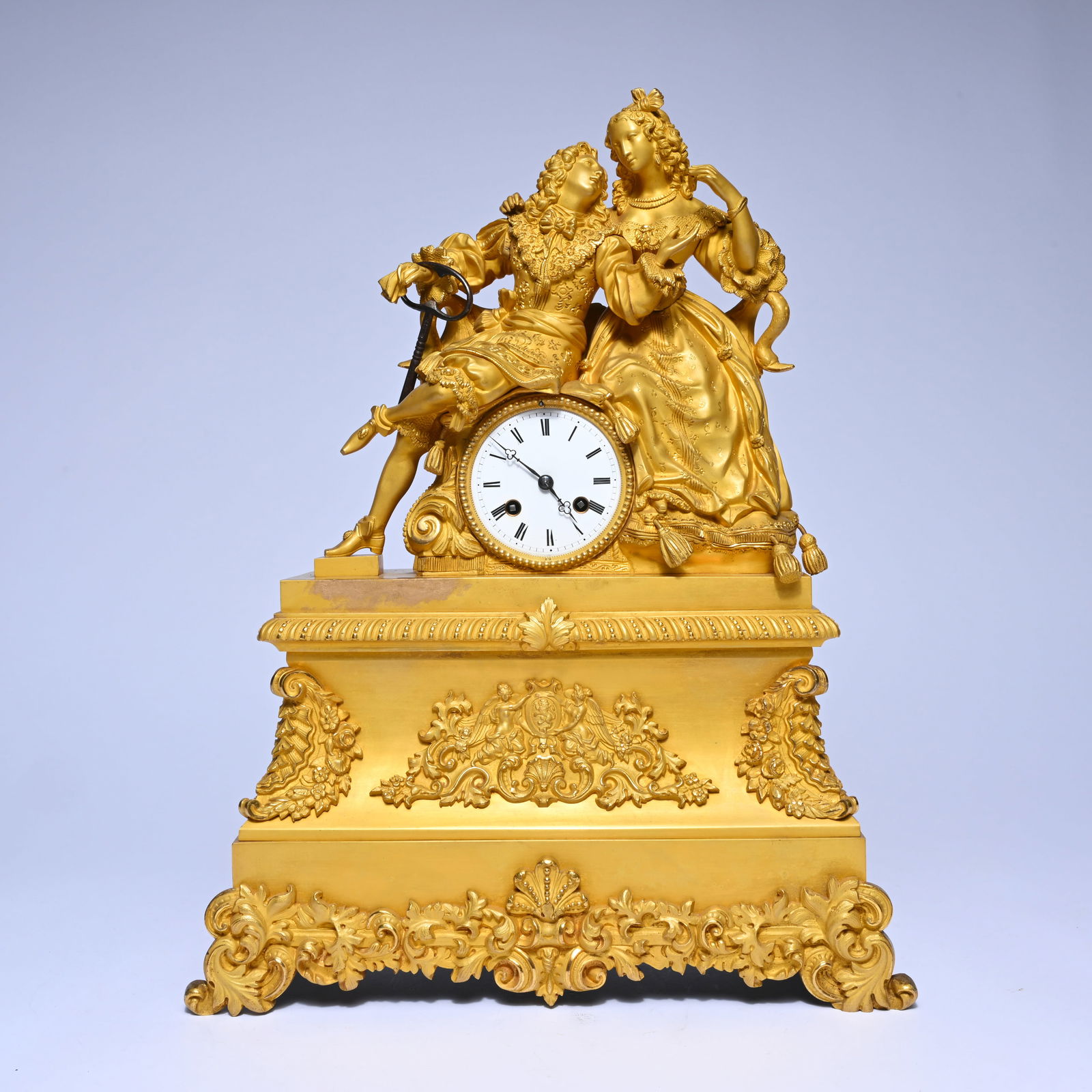 French gilt bronze mantel clock, Louis XV style, decorated with two elegantly dressed figures in (1 of 7)