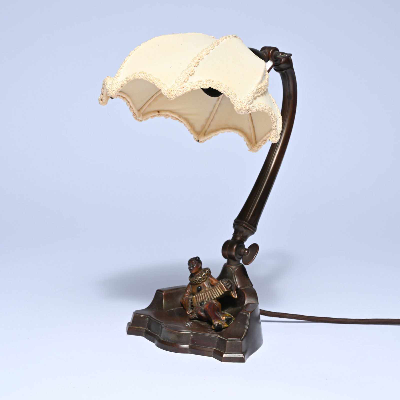 Art Deco table lamp with adjustable curved metal arm on a stepped base, decorated with a small (1 of 6)