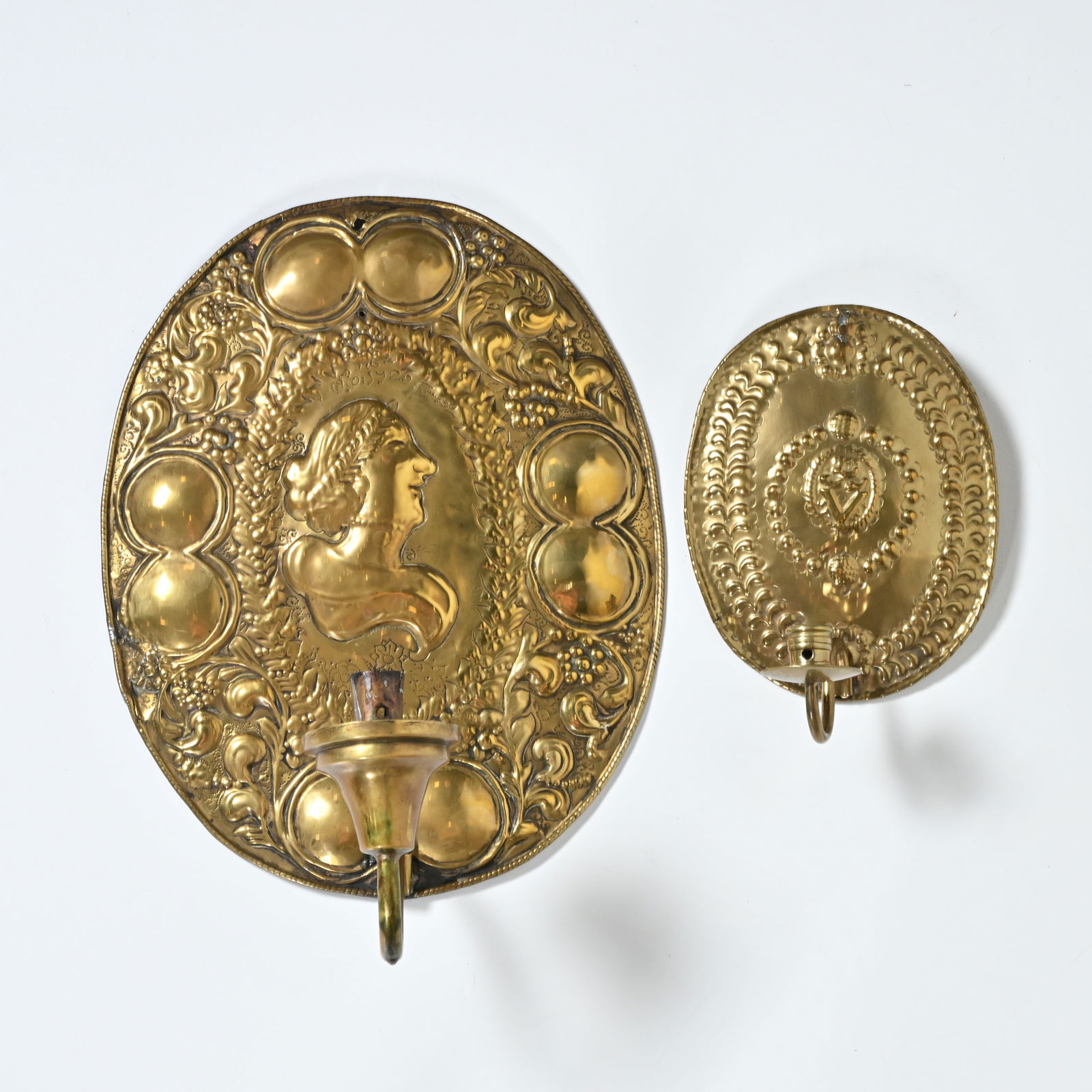 2 gilded copper wall sconces with oval, richly embossed back plates, dated 1726 & the small one 19th (1 of 4)