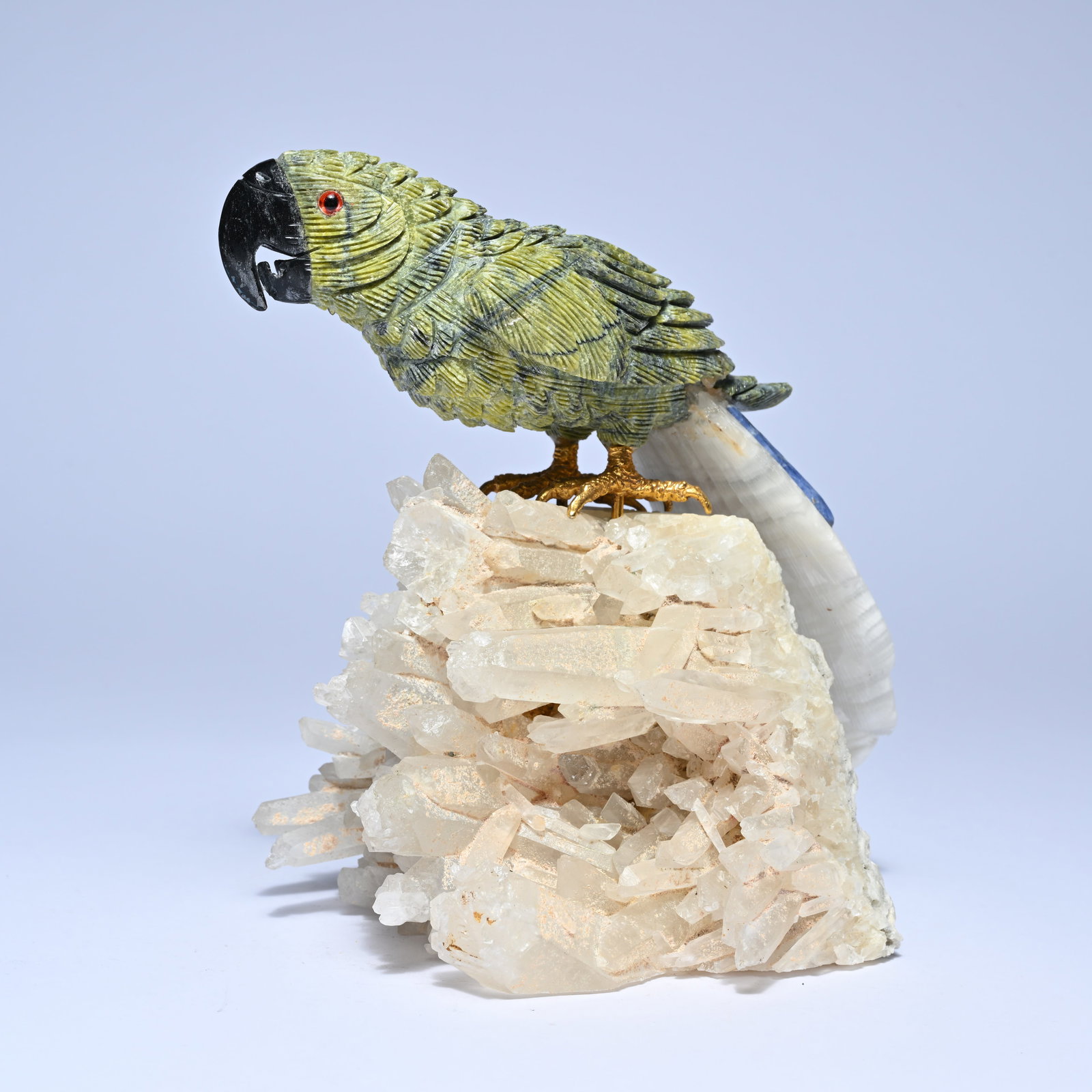 Lapidary art, parrot in sodalite with bronze feet on a rock crystal base (1 of 6)