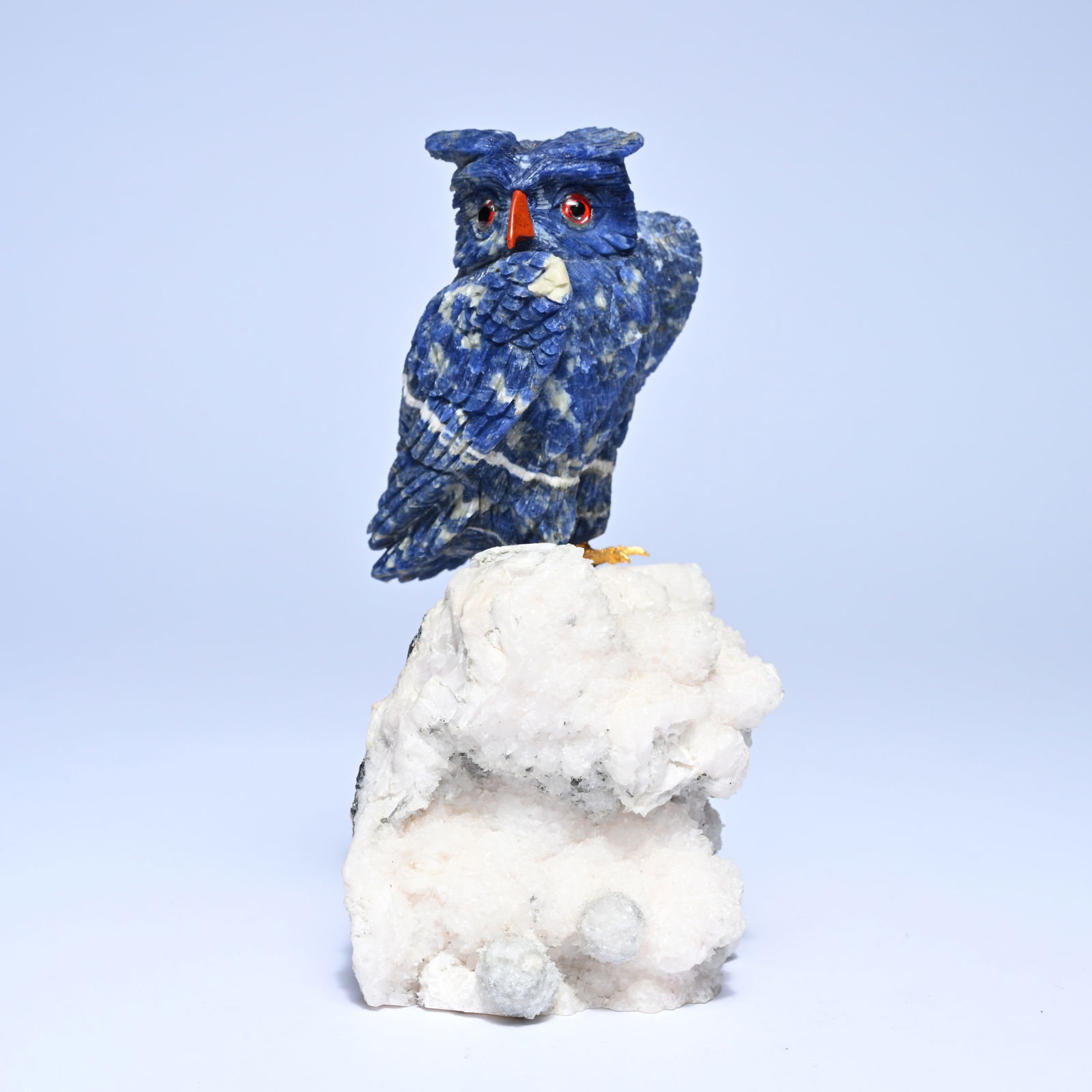 Lapidary art, owl in Lapis Lazuli with bronze legs on a coral base (1 of 7)