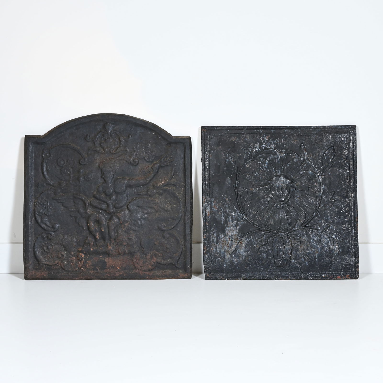 2 antique cast iron firebacks: one with the image of Christ & one with the image of an eagle., (1 of 2)