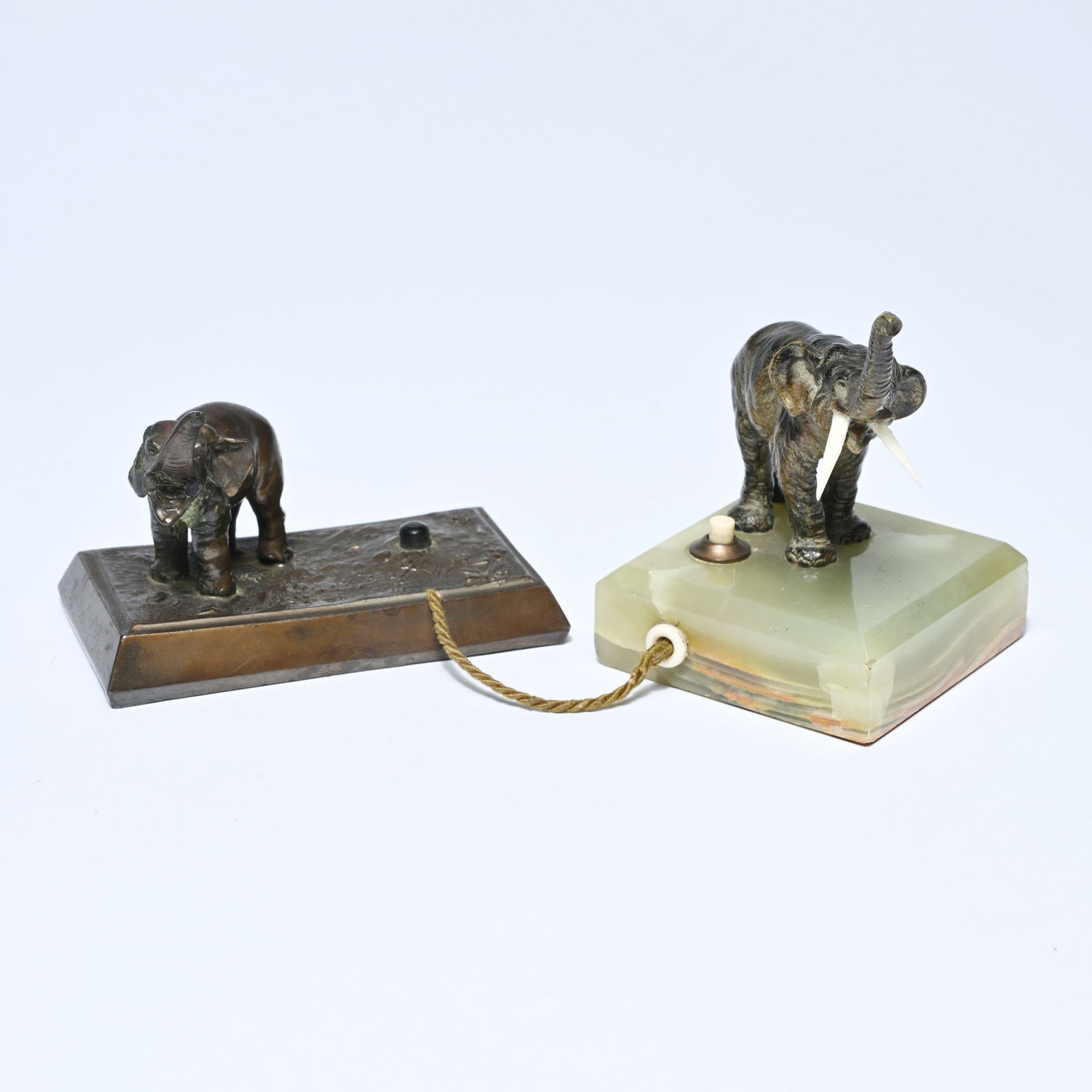 2 salon bells or butler bells in bronze, each with an elephant. One on an onyx base, one on a bronze (1 of 7)