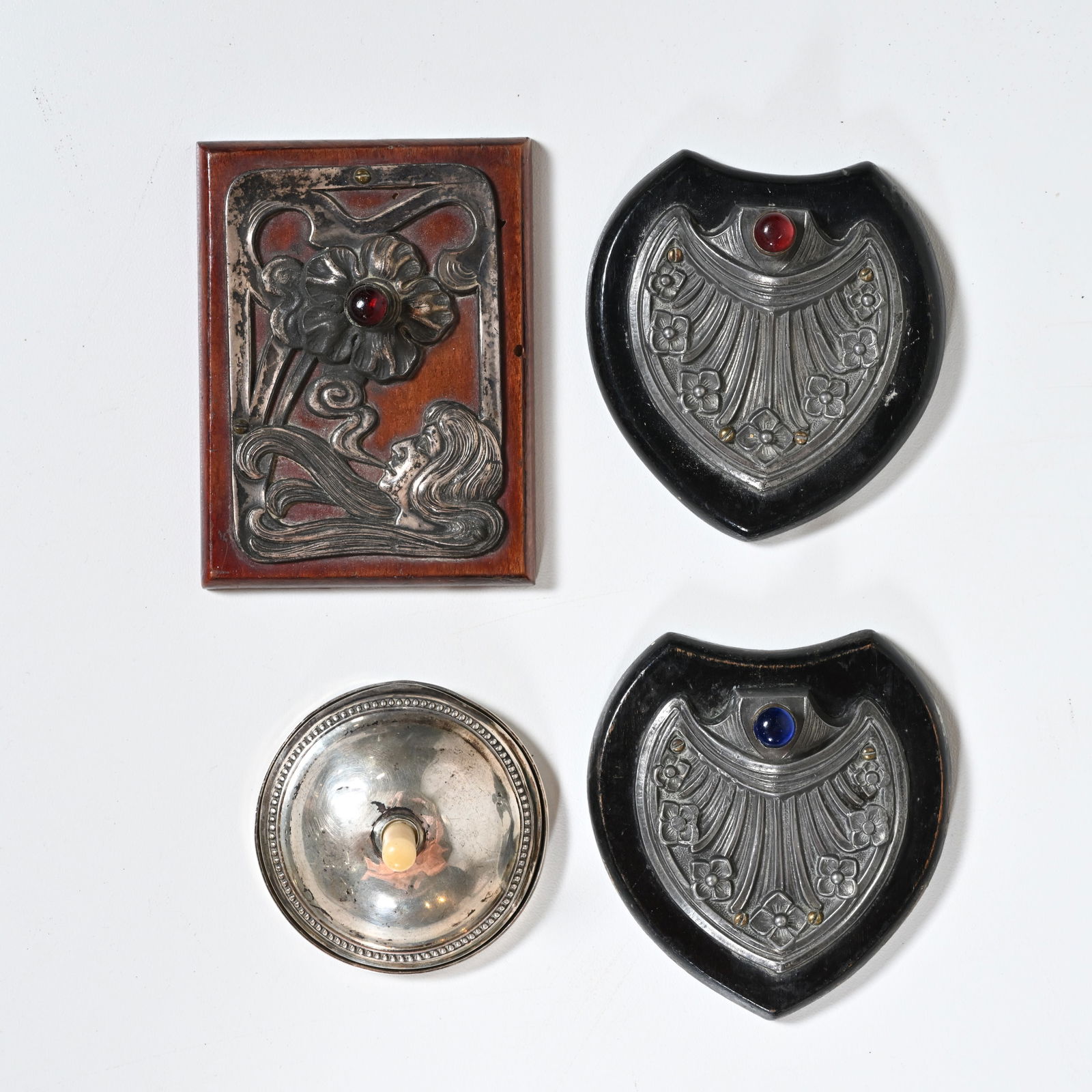 4 parlour bells and butler bells in silver and silver-plated. Art Nouveau design (1895-1910),: 4 parlour bells and butler bells in silver and silver-plated. Art Nouveau design (1895-1910), French, Belgian. One example is English, with silver marks, two are marked with a 'Bractea' sticker for th