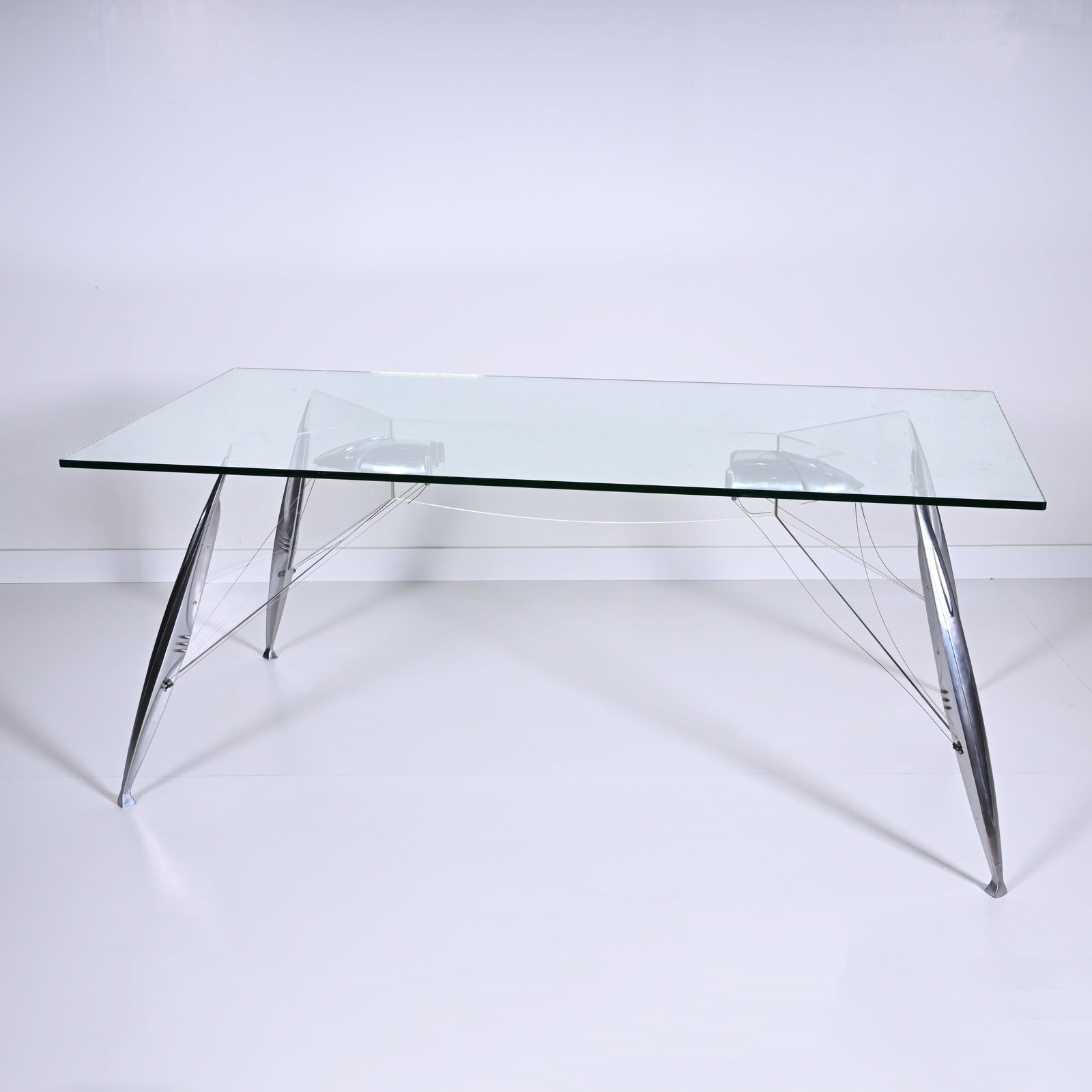 Dining table with a glass top and a chrome base with 'spider legs', 1980s-1990s (1 of 7)