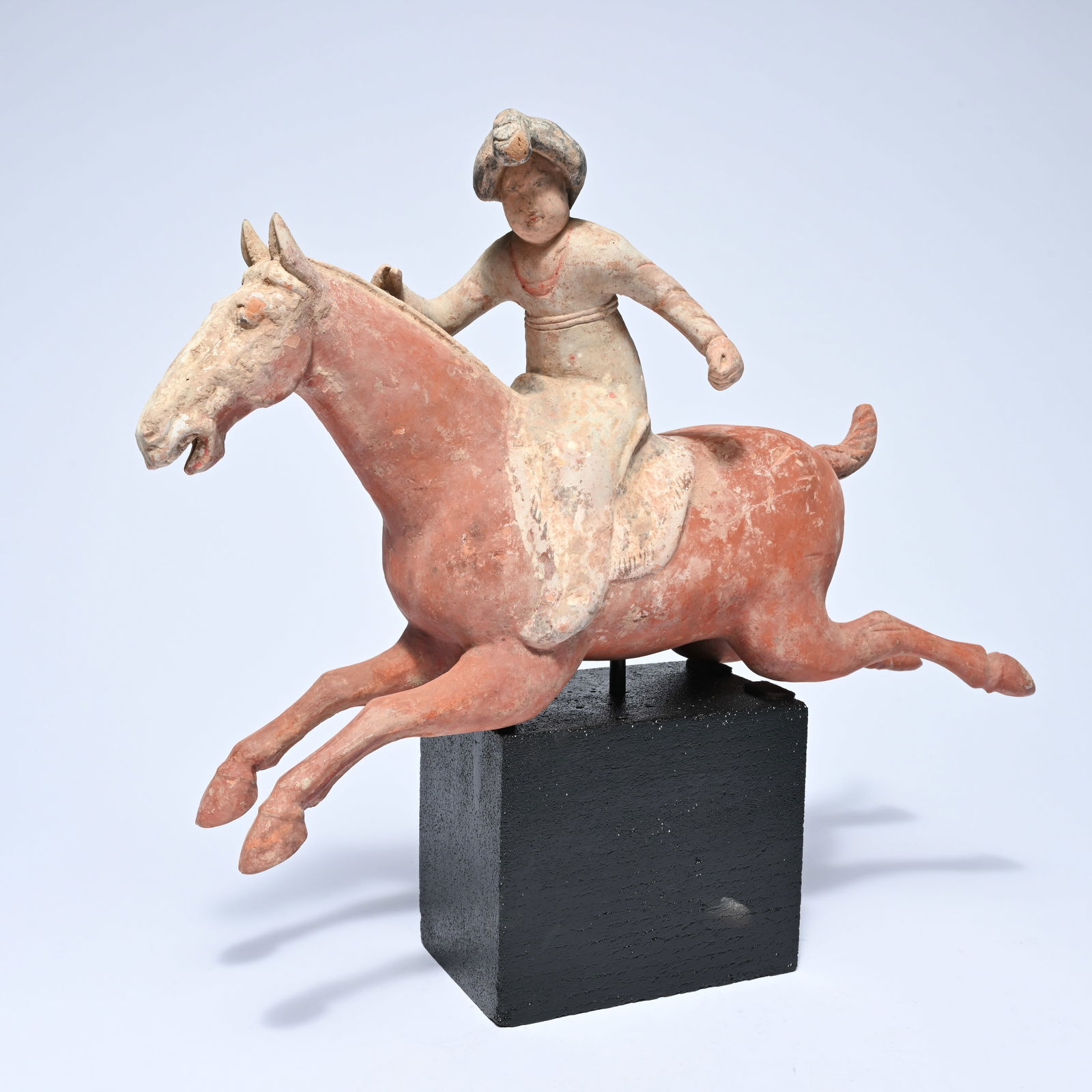 Chinese terracotta statue of a galloping horse with a polo player with polychrome painting, Tang (1 of 8)
