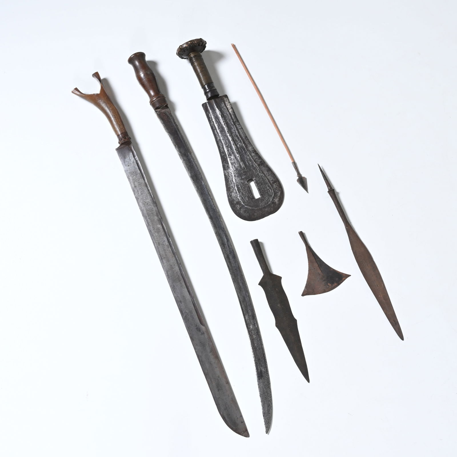 Tribal weapons, knives, spearheads and an arrow (1 of 4)