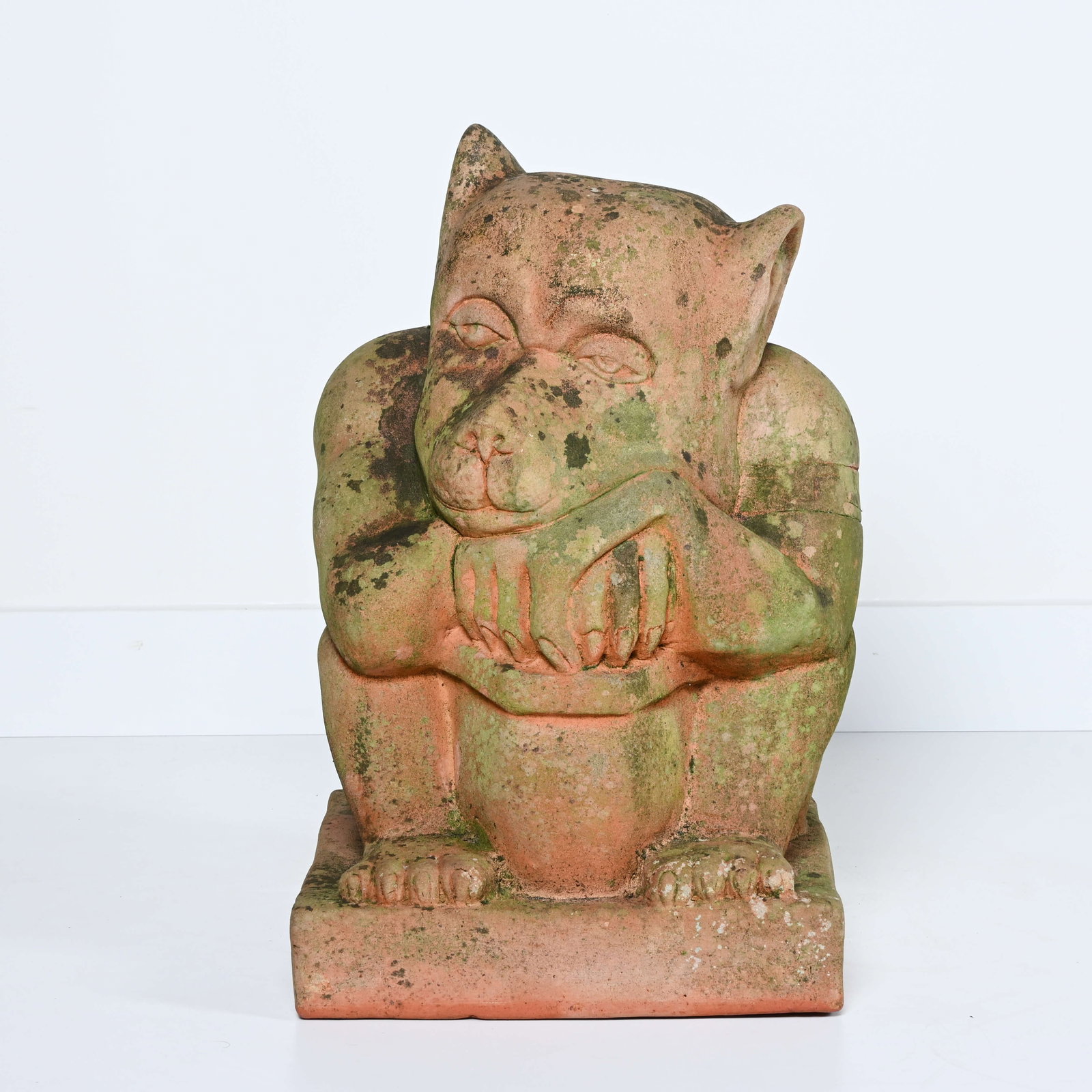 Terracotta garden statue of a sitting troll with a beautiful weathered appearance (1 of 5)