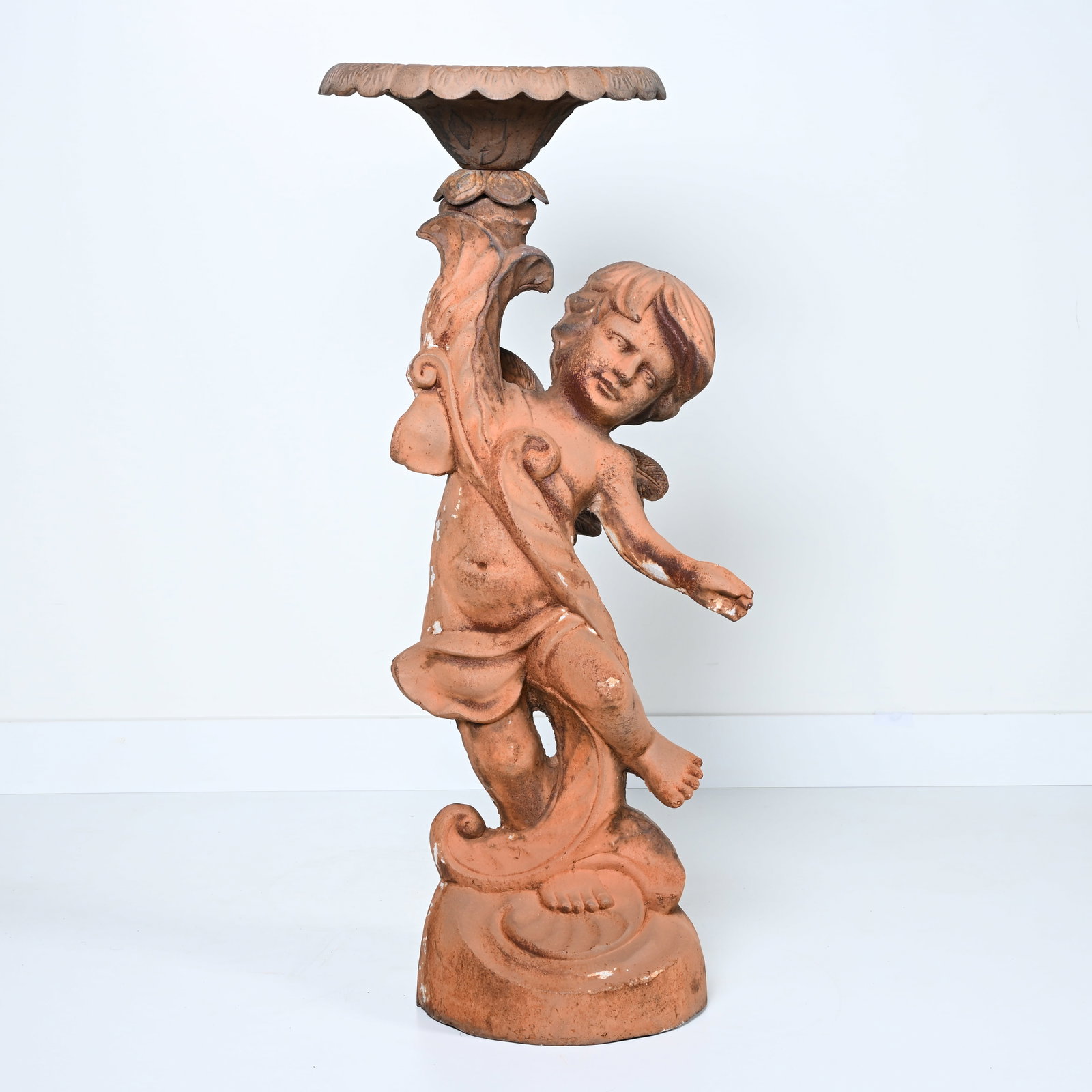 Cast iron garden ornament in the shape of a standing putto with birdbath (1 of 6)