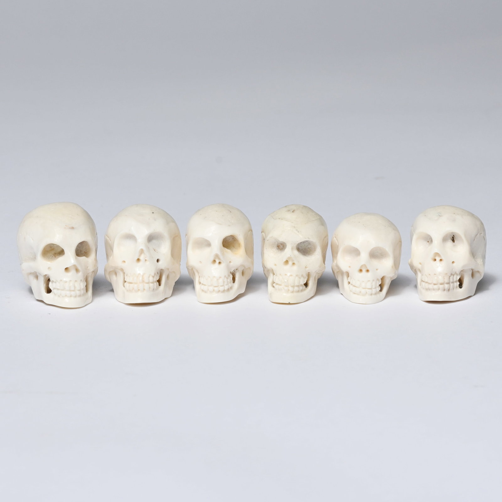 6 Tibetan memento mori skulls from a prayer bead necklace, made from yak bone (1 of 6)