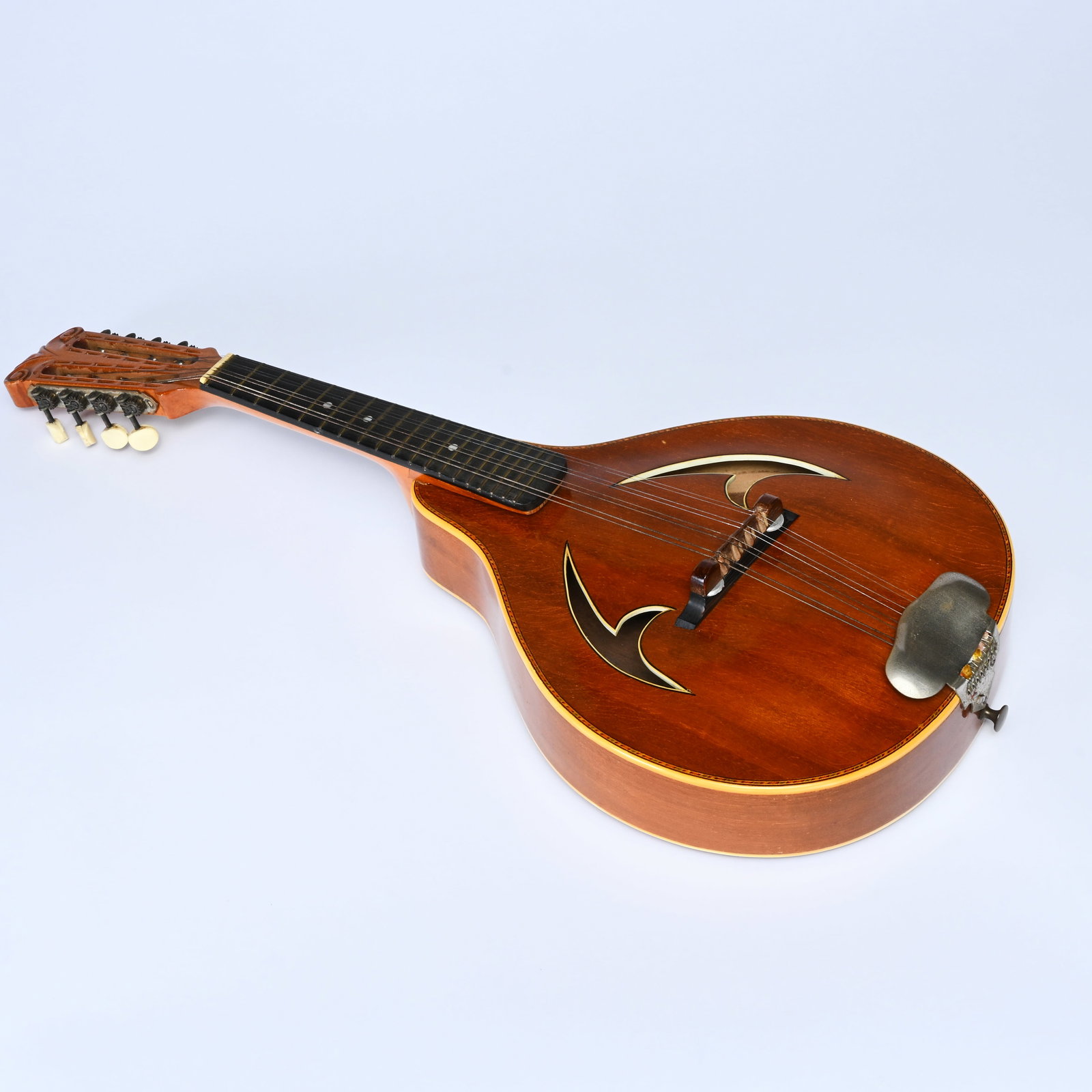 Vintage mandolin, mid-20th century, with flat body and decorative sound holes (1 of 8)