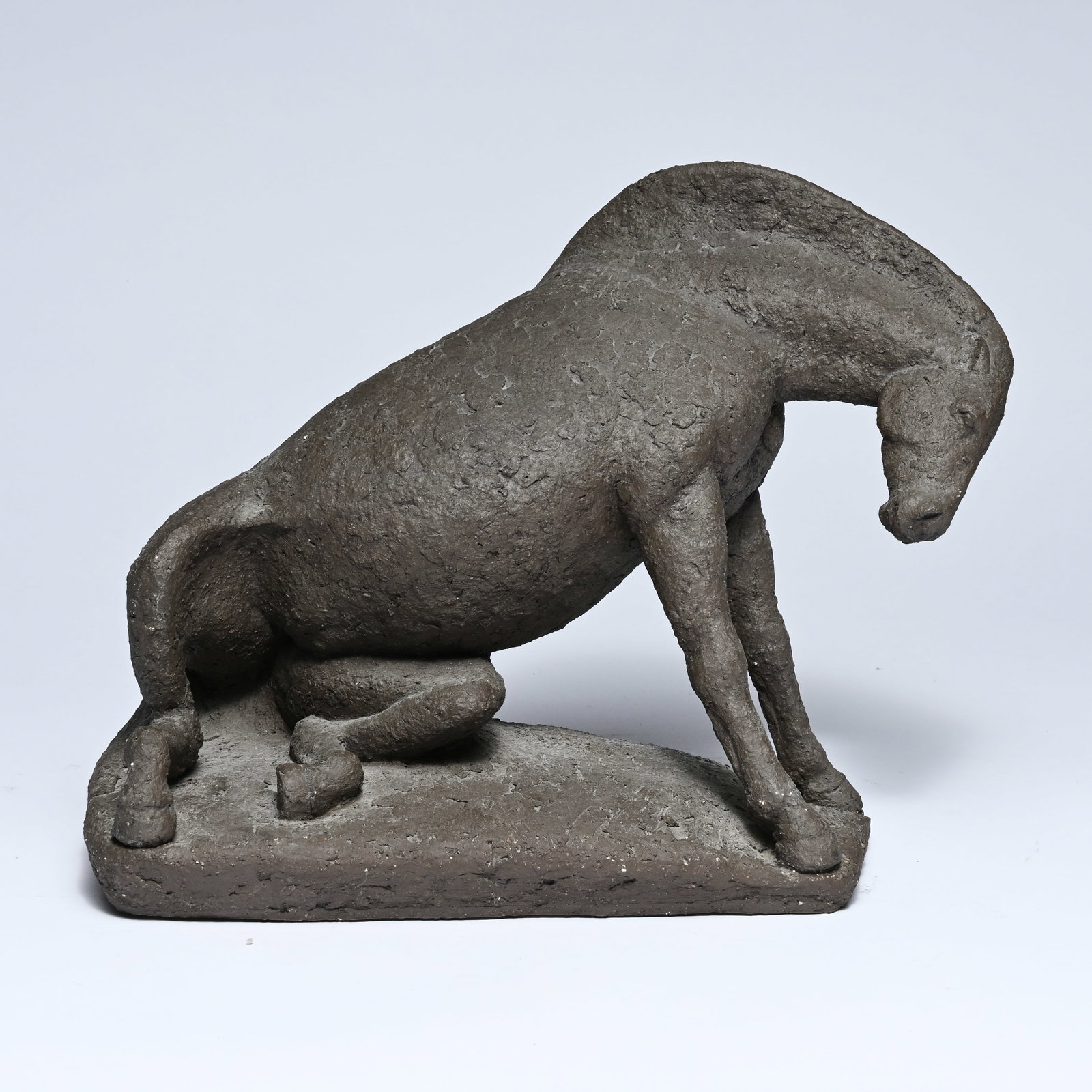 Myriam EYKENS (1938), Seated horse, terracotta sculpture, signed, numbered 1/1 and dated 1976 (1 of 5)