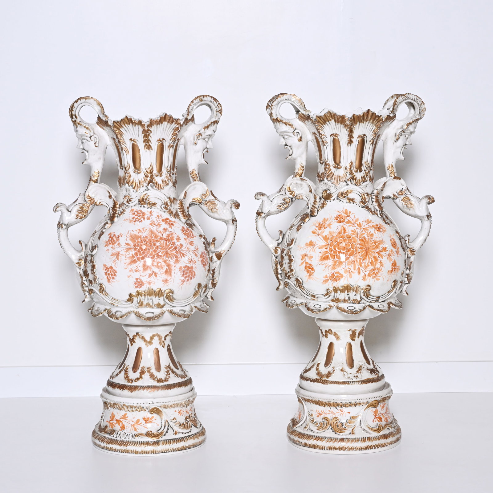 An impressive pair of Venetian earthenware vases with rich rococo relief, decorated with floral (1 of 10)