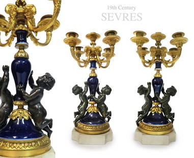 19th C. Pair of Cobalt SÃƒÂ¨vres Gilt Bronze Figural Candelabras: 19th C. Pair of Cobalt SÃƒÂ¨vres Gilt Bronze Figural Candelabras. They measure H: 19"