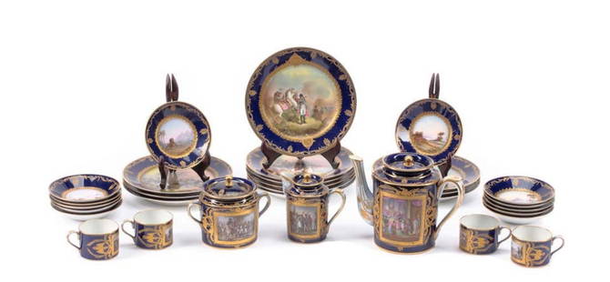19th C. Sevres Napoleonic Gilt & Polychromed Porcelain Coffee Service: 19th C. Sevres Napoleonic Gilt & Polychromed Porcelain Coffee Service. Decorated with Napoleonic scenes, comprising a coffee pot, covered sugar, creamer, twelve dessert plates and twelve coffee cans a