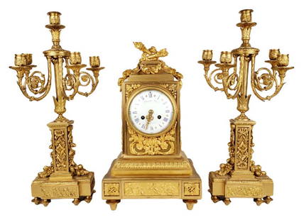 Magnificent 19th C. Raingo Fres Gilt Bronze Clockset: Magnificent 19th C. Raingo Fres Gilt Bronze Clockset. The clock measures H: 17 1/4" W: 9 3/4" and the candelabras measure H: 20 1/2" W: 9 1/4"