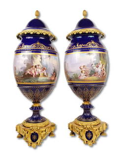 Pair of Large 19th C. French Sevres Porcealin & Bronze Vases: Pair of Large 19th C. French Sevres Porcealin & Bronze Vases. They measure H: 22 1/4" W: 6 3/4"
