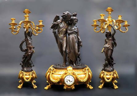 Albert-Ernest Carrier Belleuse, French Napoleon III Gilt & Patinated Bronze 3-Piece: Albert-Ernest Carrier Belleuse, French Napoleon III Gilt & Patinated Bronze 3-Piece Clock & Garniture. White & Black Enamel Dial, Roman & Arabic Numerals, signed Deniere, Circa 1870. Clock: 23" x 13"