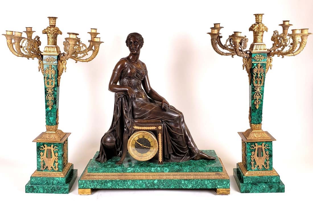 19th C. Malachite & Bronze Figural Clockset: 19th C. Malachite & Bronze Figural Clockset. The clock measures H: 26 1/2" and the candelabras measure H: 29" W: 17"