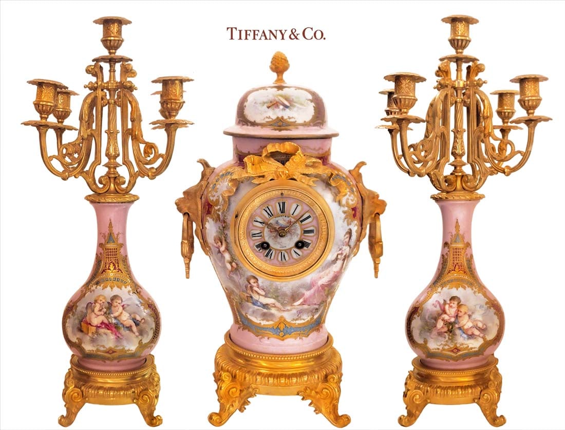 19th Tiffany & Co Pink Sevres Clockset: 19th Tiffany & Co Pink Sevres Clockset, Signed on the clock. Candelabras: H 21" x W 11 1/2" \ Clock: H 16 7/8" x W 9 7/8"