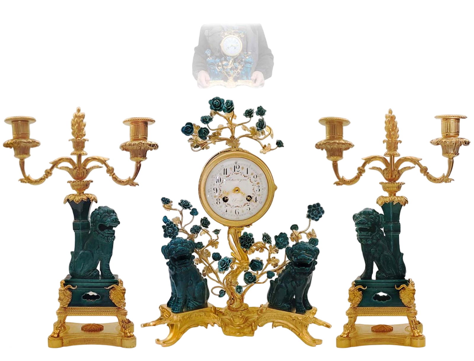 18th C. Foo Dog Chinoiseries Porcelain and Bronze French Festeau Le Jeune Clock Set: 18th C. Foo Dog Chinoiseries Porcelain and Bronze French Festeau Le Jeune Clock Set. Candelabras: H 14 1/2" x W 4 1/2" x L 9 1/2" \ Clock: H 15 1/2" x W 7" x L 12 1/2"