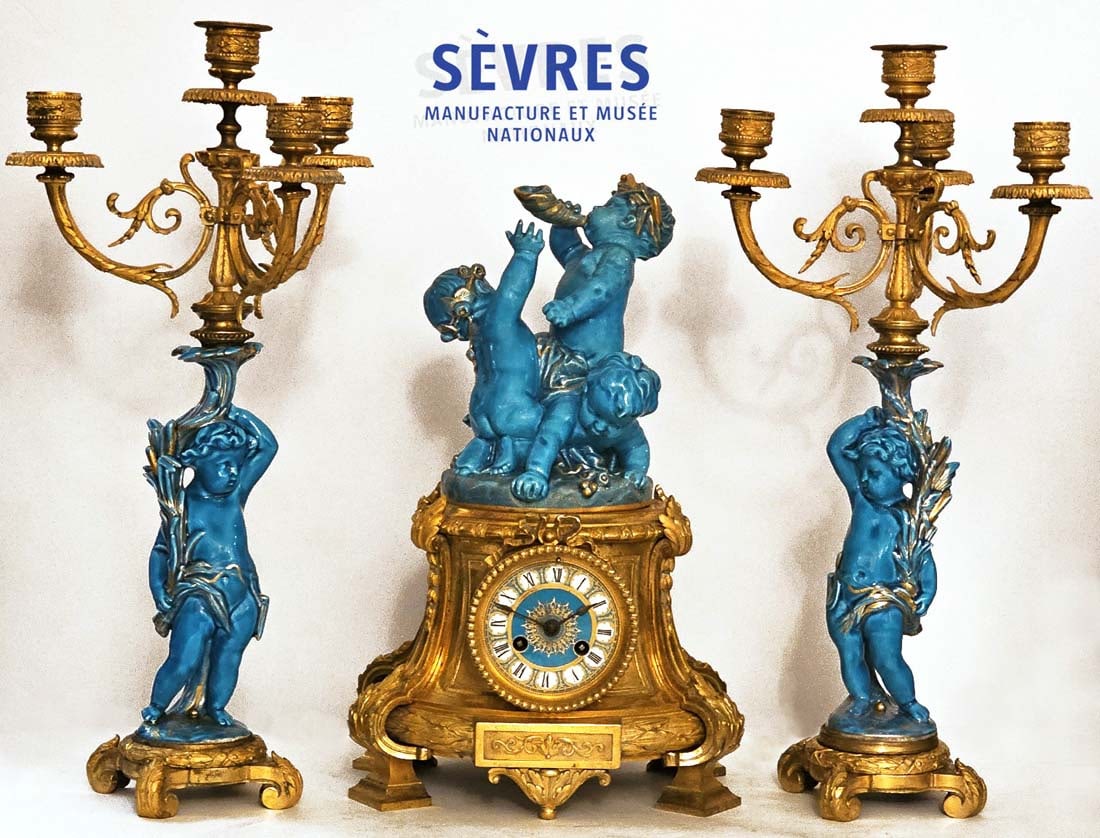19th C. French Sevres Porcelain Cherub Angels Candelabra Bronze Mounted Clockset: 19th C. French Sevres Porcelain Cherub Angels Candelabra Bronze Mounted Clockset. Clock: H 15" x W 7" x L 10" \ Candelabras: H 17 1/8" x W 7"