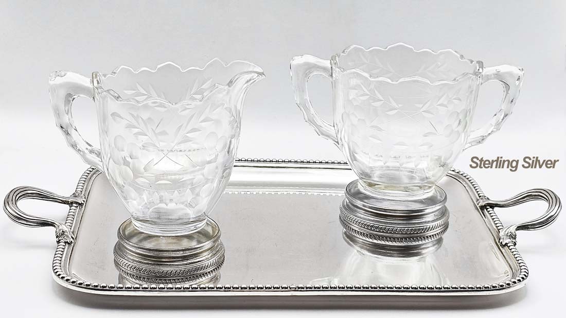 Three Piece Sterling Silver (504g) Overlay Creamer Set With Tray: Three Piece Sterling Silver (504g) Overlay Creamer Set With Tray. Tray: W 7 1/2" x L 12 1/4" \ 2 handle Creamer: H 3 7/8" x W 3 1/2" x L 5 1/2" \ Creamer: H 4 1/4" x W 3" x L 4 1/2"