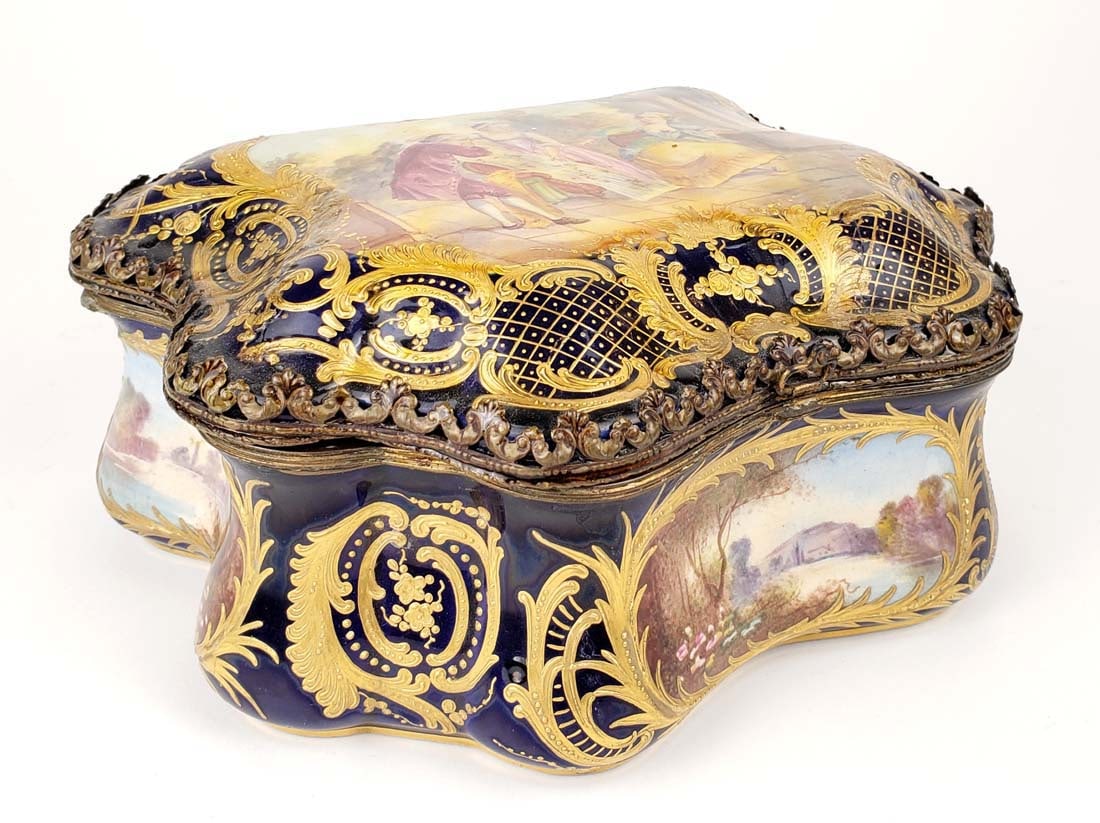 19th C. Sevres Porcelain Jewelry Box: 19th C. Sevres Porcelain Jewelry Box. Measures H: 4" x 8 3/4" x 6 3/4"