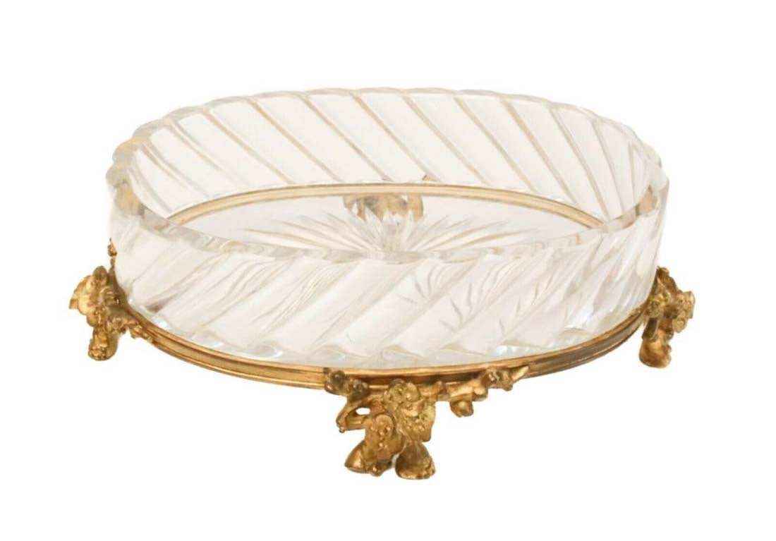 19th C. Baccarat Crystal & Gilt Bronze Centerpiece Bowl: 19th C. Baccarat Crystal & Gilt Bronze Centerpiece Bowl. Baccarat crystal cut glass and gilt bronze centerpiece bowl. Beautiful swirled ripple design texture to the edge of the glass. Baccarat mark to
