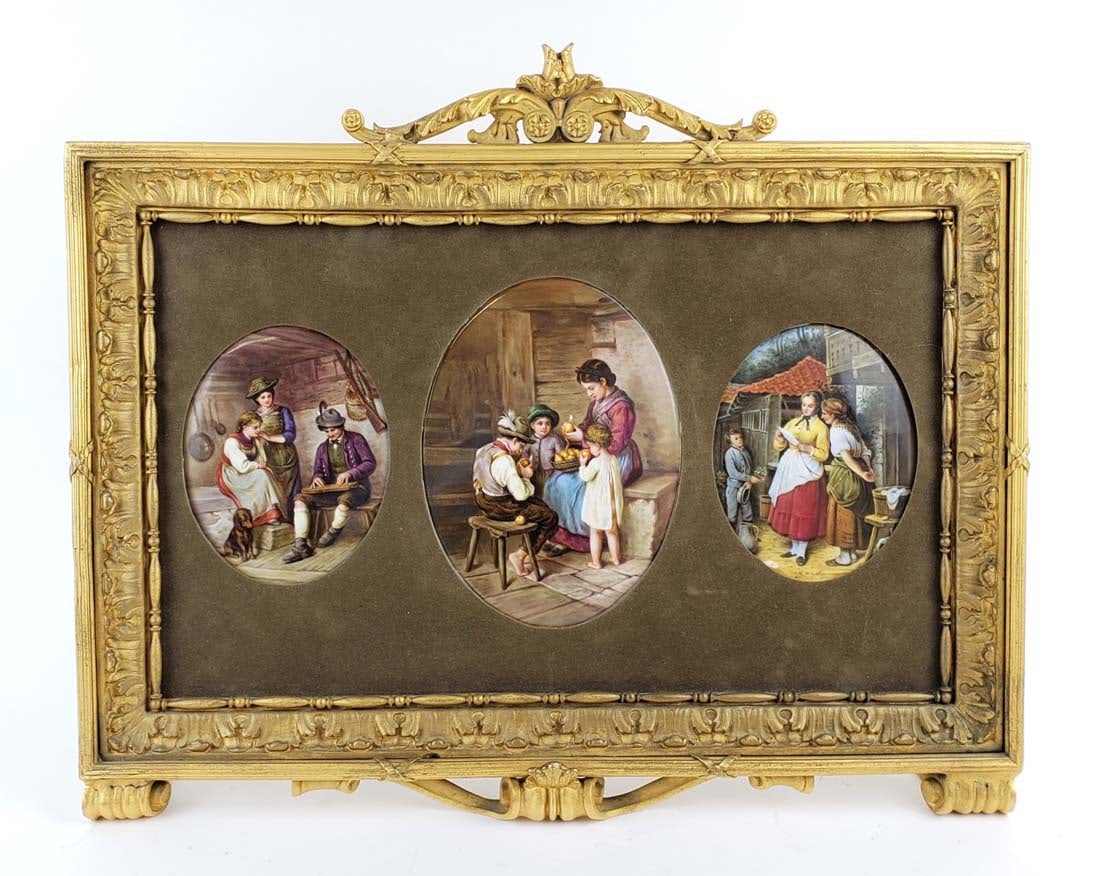 19th C. Framed Set of 3 German Porcelain Plaques: 19th C. Framed Set of 3 German Porcelain Plaques. The frame measures 14 1/2" x 17 1/2", the side plaques measure 5" x 3 3/4" and the middle plaque measures 5" x 3 3/4"