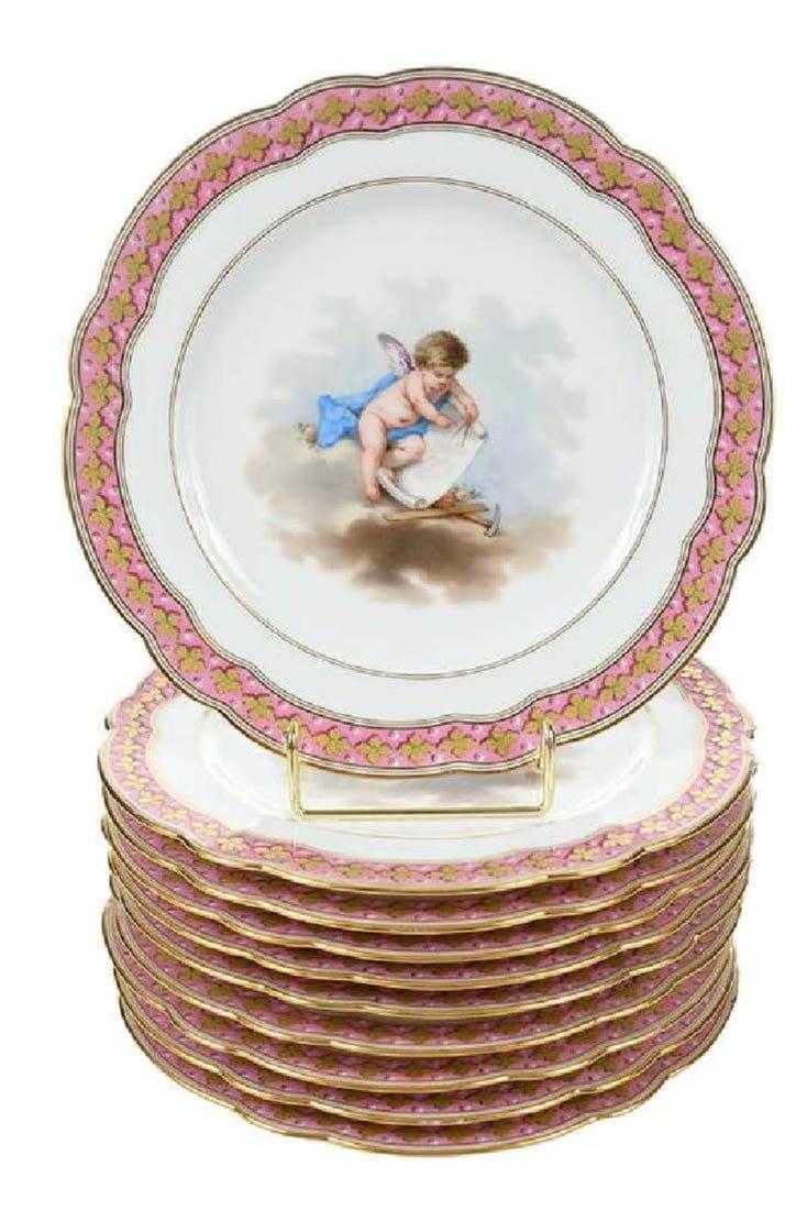 Set of 10 Late 19th C. Le Rosey Hand Painted Cabinet Plates: Set of 10 Late 19th C. Le Rosey Hand Painted Cabinet Plates. They measure 9" diameter. Each with a different cherub in various poses, pink and gilt decorated scalloped border, signed verso "Le Rosey