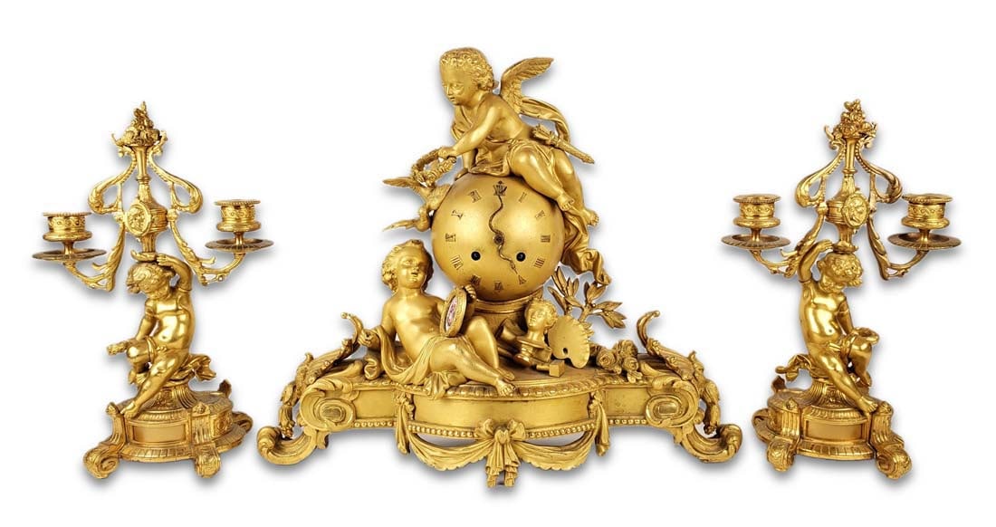 19th C. Magnificent French Gilt Bronze Figural Clockset: 19th C. Magnificent French Gilt Bronze Figural Clockset. The clock measures H: 13 3/4" W: 16 3/4" and the candelabras measure H: 12" W: 7 3/4"