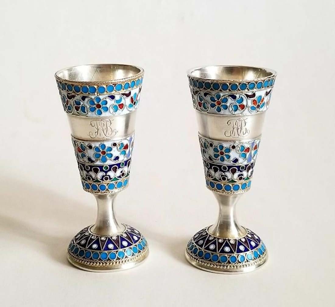 Pair of 19th C. Russian 84 Silver & Enamel Cups: Pair of 19th C. Russian 84 Silver & Enamel Cups. Both with monogramed letters on the front . Hallmarked to the base and middle . Weight 75 gm . Size: 2 3/4" ( 7 cm ) high , 1 1/8" ( 3 cm ) diameter.