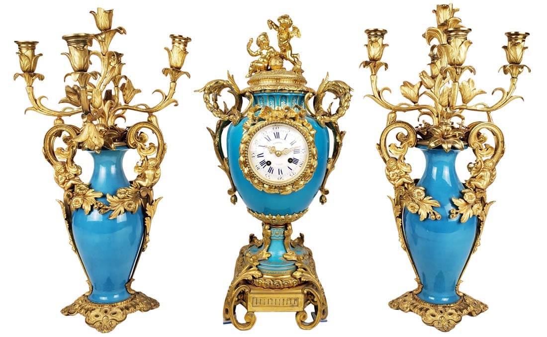 19th C. Sevres Bronze & Porcelain Clockset: 19th C. Sevres Bronze & Porcelain Clockset. The clock measures H: 22" W: 12" and the candelabras measure H: 22 1/4" W: 12 1/4"