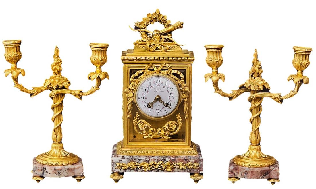 19th C. French Rouge Marble Gilt Bronze Mounted Clockset: 19th C. French Rouge Marble Gilt Bronze Mounted Clockset. Candelabras: H 9 7/8" x W 3 1/2" x L 7 1/2" \ Clock: H 12 1/2" x 4 1/2" x L 6 1/2"