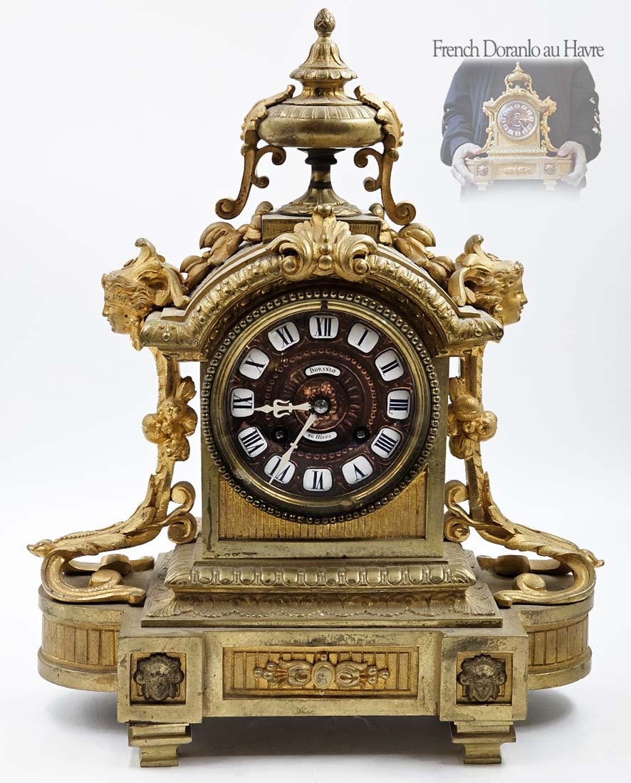 19th C. French Figural Bronze Mantel Clock Doranlo au Havre: 19th C. French Figural Bronze Mantel Clock Doranlo au Havre. H 14" x W 5 1/2" x L 11"