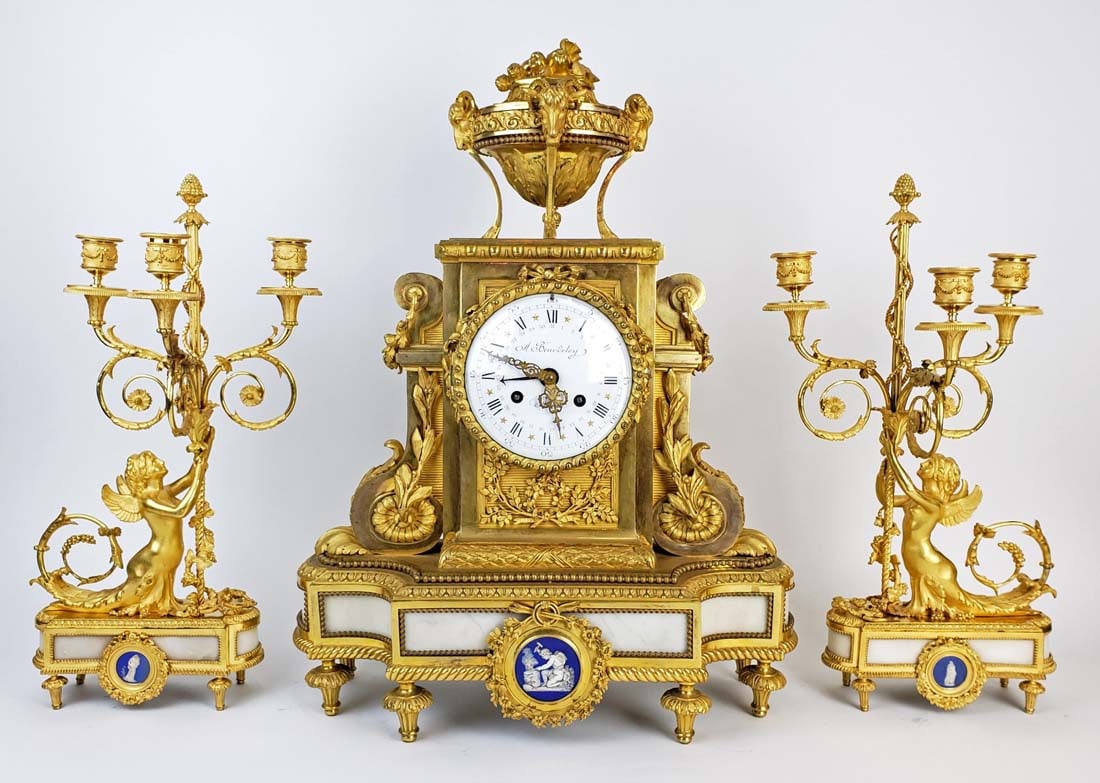 19th C. Beurdeley 3 Pc. Gilt Bronze Mounted Marble Clockset w/ Wedgewood Plaques, Circa 1880: 19th C. Beurdeley 3 Pc. Gilt Bronze Mounted Marble Clockset w/ Wedgewood Plaques, Circa 1880. The clock measures H: 23 1/2" W: 18" D: 7" and the candelabras measure H: 18 3/4" W: 9 3/4"