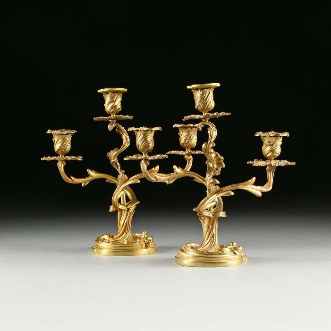Pair of Late 19th C. Louis XV Style Gilt Bronze Candelabras: Pair of Late 19th C. Louis XV Style Gilt Bronze 3 Arm Candelabras. They measure H: 10 3/4" W: 11"