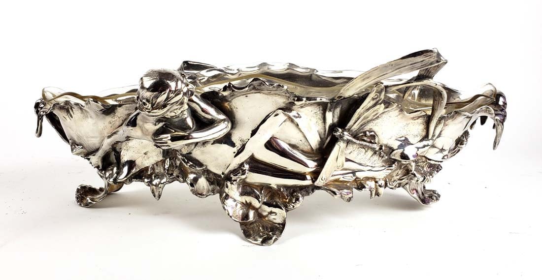 A WMF Figural Silverplated & Crystal Centerpiece: A WMF Figural Silverplated & Crystal Centerpiece. Measures H: 6" W: 17 1/4"