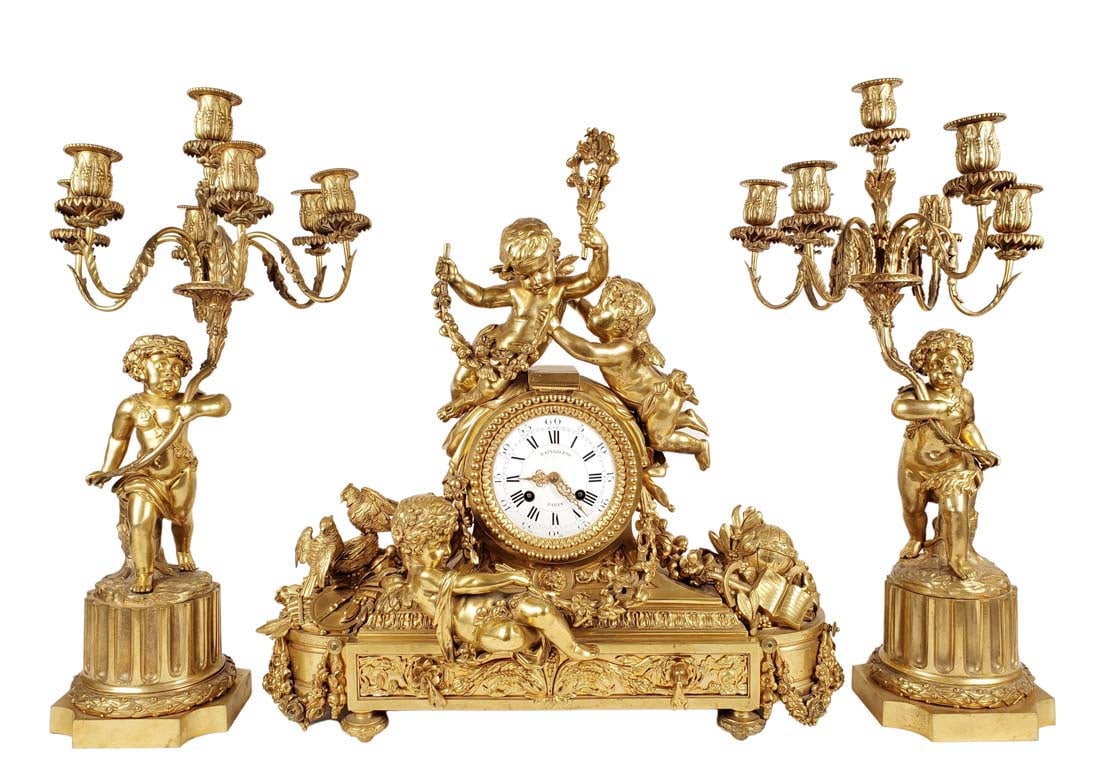 Magnificent 19th C. Raingo Freres Signed French Napoleon Louis XVI Gilt Bronze Figural: Magnificent 19th C. Raingo Freres Signed French Napoleon Louis XVI Gilt Bronze Figural Clockset. The clock measures H: 22 3/4" W: 23 1/4" D: 10 1/4" and the candelabras measure H: 24". Napoleon III