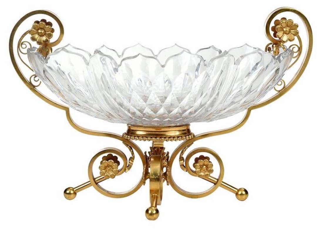 French Baccarat Crystal and Bronze Centerpiece: French Baccarat Crystal and Bronze Centerpiece. French, late 19th century, shaped cut crystal oval bowl with scalloped rim, situated in a gilt bronze frame with two scrolled handles terminating in fou