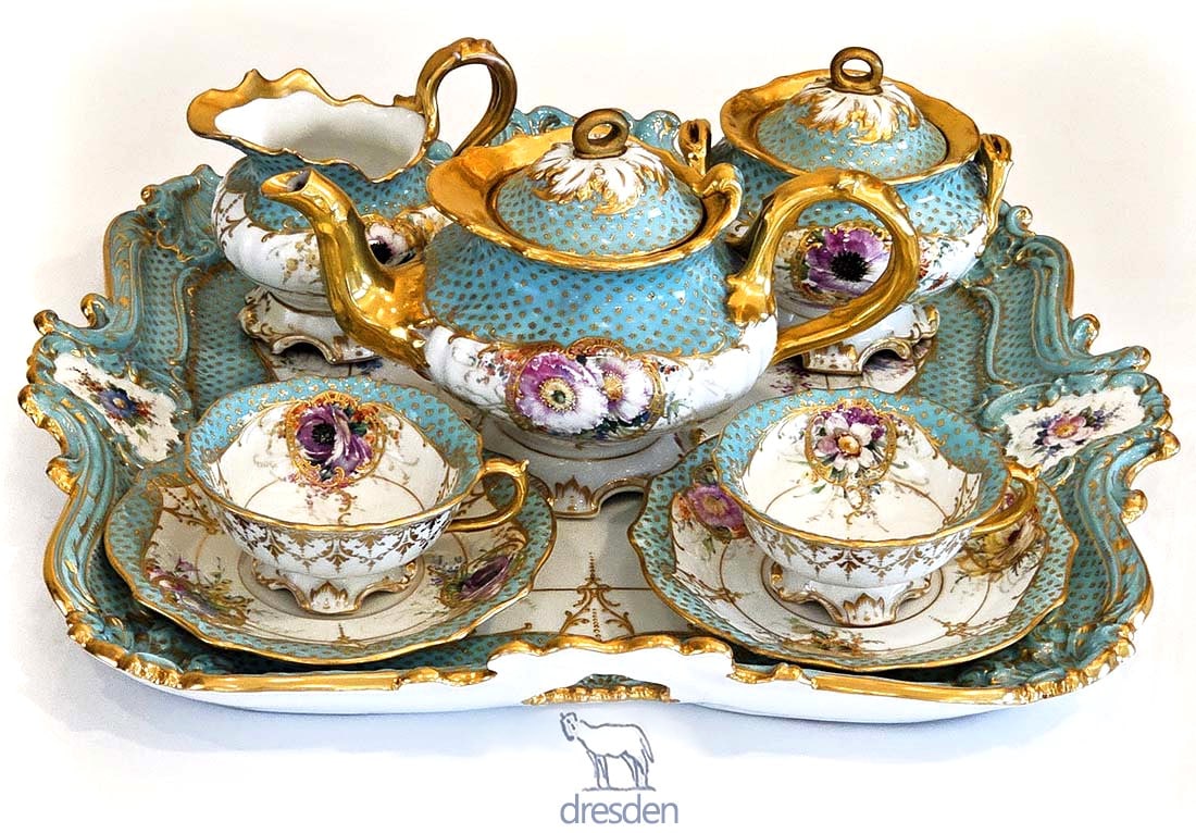 Set Of Eight Piece 19th C. Hand Painted Dresden Lamb Tea Set: Set Of Eight Piece 19th C. Hand Painted Dresden Tea Set. Tray: H 2 3/8" x W 15" x L 16" \ Cups: H 2" x W 4" x L 4 1/2" \ Saucers: H 7/8" x D 6" \ Creamer: H 4 1/2" x W 4" x L 5" \ Tea pot: H 5 1/2" x 