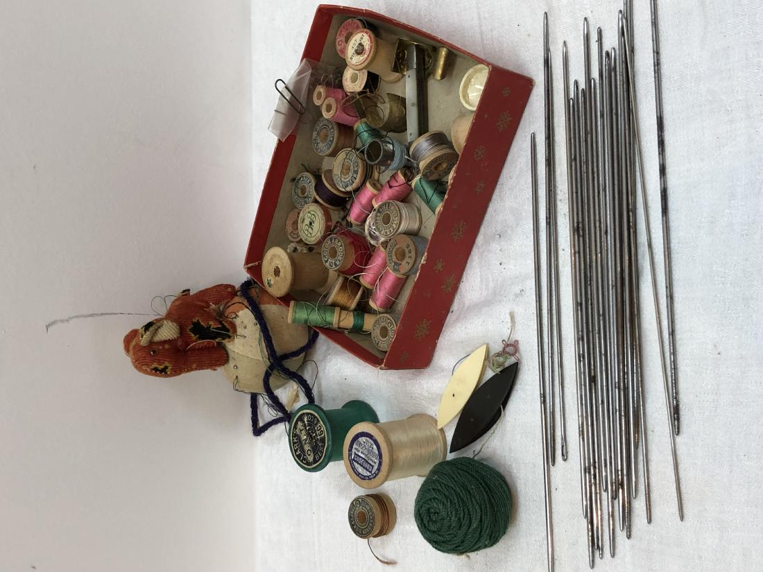 Collection of vintage sewing items.