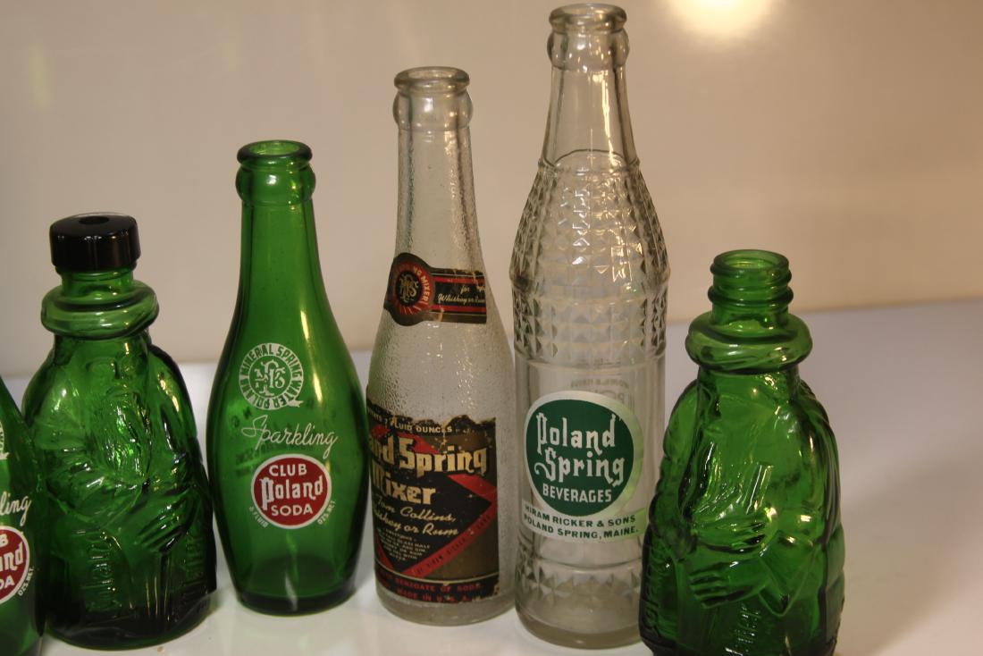 Lot of 6 Vintage Poland Springs Water Bottles: Lot of 6 Poland Springs glass bottles, 2 of which are half pint Moses bottles clean embossed Poland Springs Beverges.
