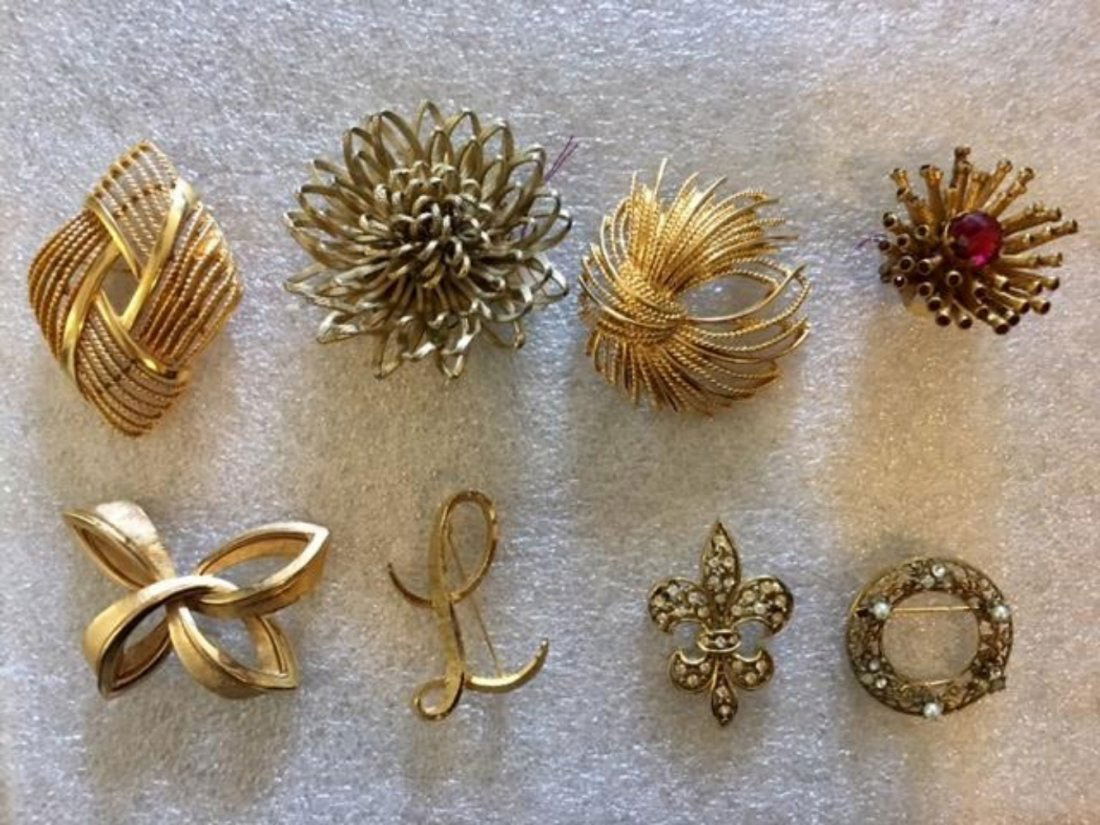 Set of 8 Vintage Brooches Monet Trifari: Set of 8 Vintage Brooches including 2 by Monet, 1 Trifari, 1 Mamselle and others apparently unmarked. Largest 2.5"D. In house shipping to continental US $15.