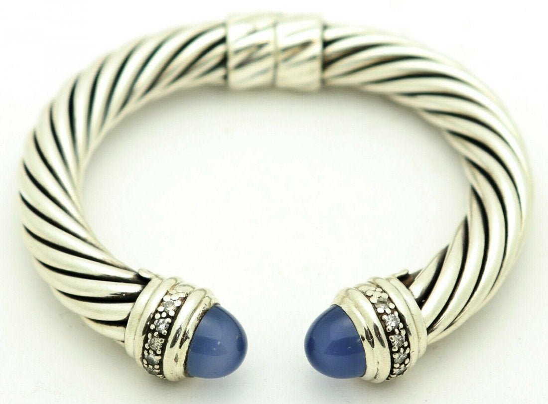 David Yurman 10mm 925 sterling cable bracelet Diamond: David Yurman 10mm 925 sterling cable bracelet with Diamonds Size 7.5". Stones: 16 0.01ct round diamonds. In house shipping to continental US $15.