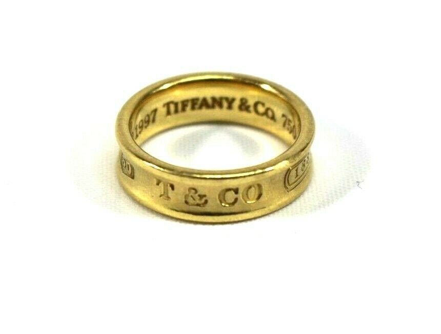 TIFFANY & Co 18K 750 Yellow Gold Concave Band Ring: TIFFANY & Co. 18K 750 Yellow Gold 1837 Concave Band Ring Size 7. Weight - 5.1dwt / 7.9g. In house shipping to continental US $15.
