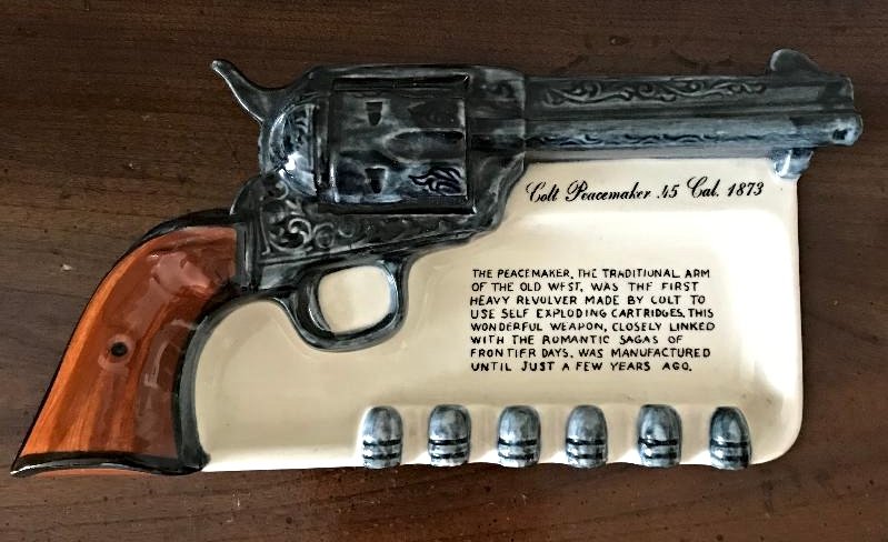 Vintage Ceramic Colt Peacemaker Wall Plaque or Pin Dish: Vintage Ceramic Colt Peacemaker Wall Plaque or Pin Dish. Measures 9"L x 5"H. In house shipping is available, buyer pays shipping cost.